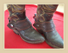 Bib spur straps, doubled and stiched with barb wire stamp