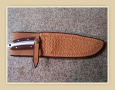 Tooled leather knife sheath