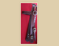 headstall with rawhide buckles and barbwire stamping