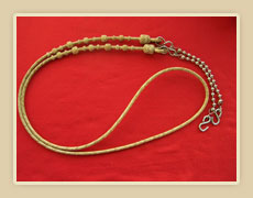 Braided rawhide roping rein.
