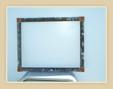 Flat frame with moss and tooled leather wrapped corners