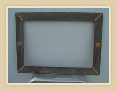 Barnwood frame with braided rawhide corners and leather accents