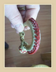 Rawhide honda with colored string.