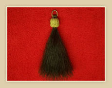 Horse hair shoo-fly with rawhide knots