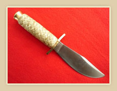 Braided rawhide knife handle, solingen steel blade.