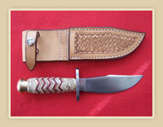 Hunting knife, solingen steel blade with rawhide handle