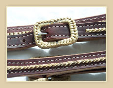 Rawhide braided buckle and rawhide accents.