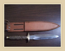 Rawhide braided knife handle and leather knife sheath