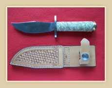 New soigné steel blade, rawhide braided handle