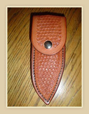 Tooled leather knife sheath