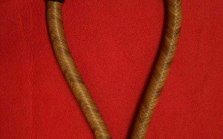 Harness leather, light body with dark nose button and heal knot