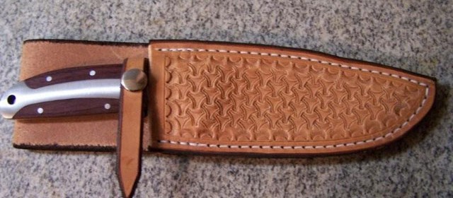 Tooled leather knife sheath