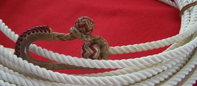 King rope with rawhide hondo with colored string