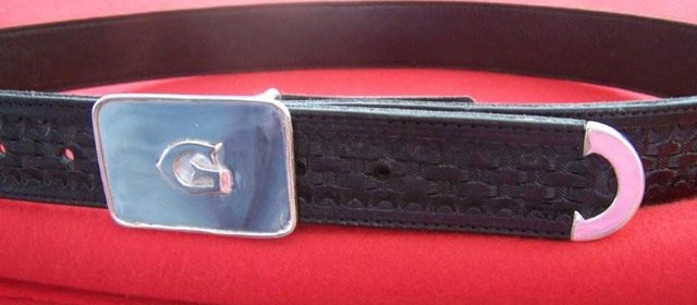 Sterling Silver Belt buckle and tip, dyed english leather tooled belt.