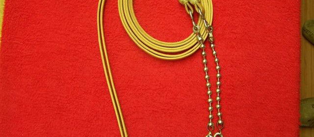 Leather split reins with rawhide knots and ball chains