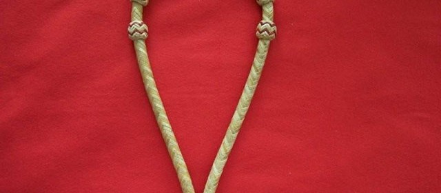 1/2 inch rawhide bosal with color string